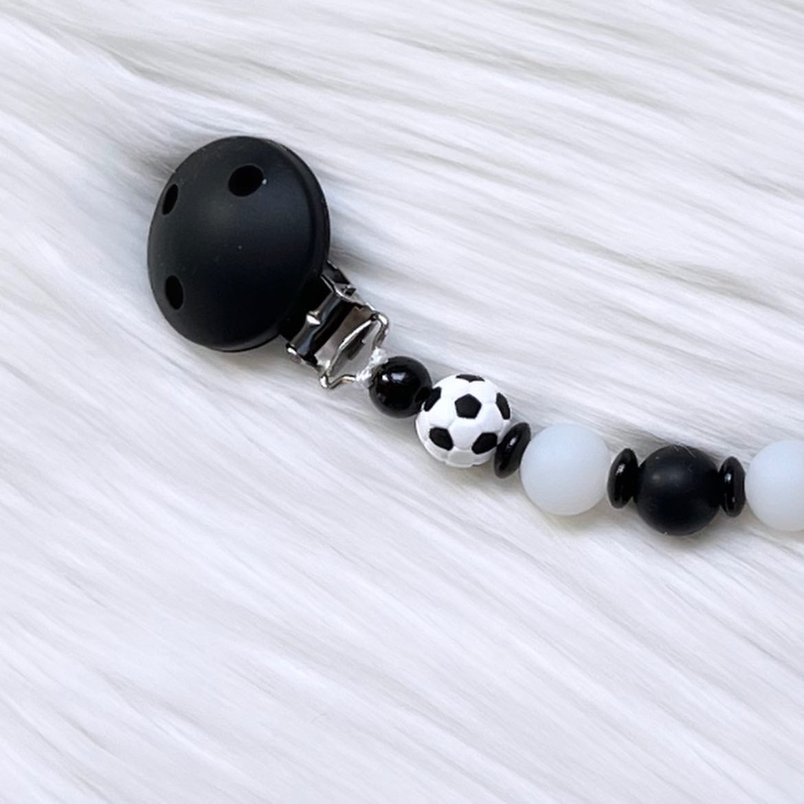 Schnullerkette Fußball mit Leuchtperlen