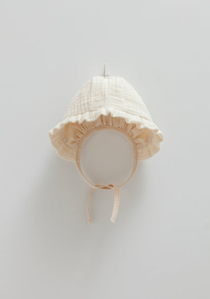 Baby Mütze Rüschen
Musselin

Baby Mütze Musselin mit Rüschen Ecru 0-9 Mon.